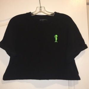 Black top with an alien holding up a peace sign